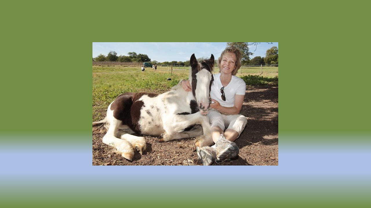 Jenny Seagrove, Mane Chance Sanctuary Founder, posting under tree with horse